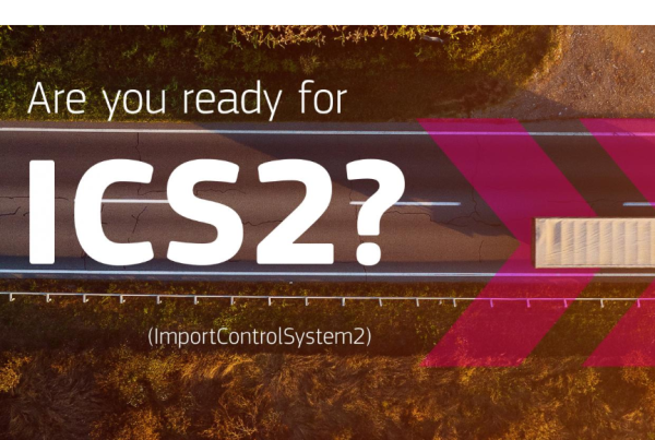 Aerial road banner reading “Are you ready for ICS2? (Import Control System 2)” with a truck and pink arrows.